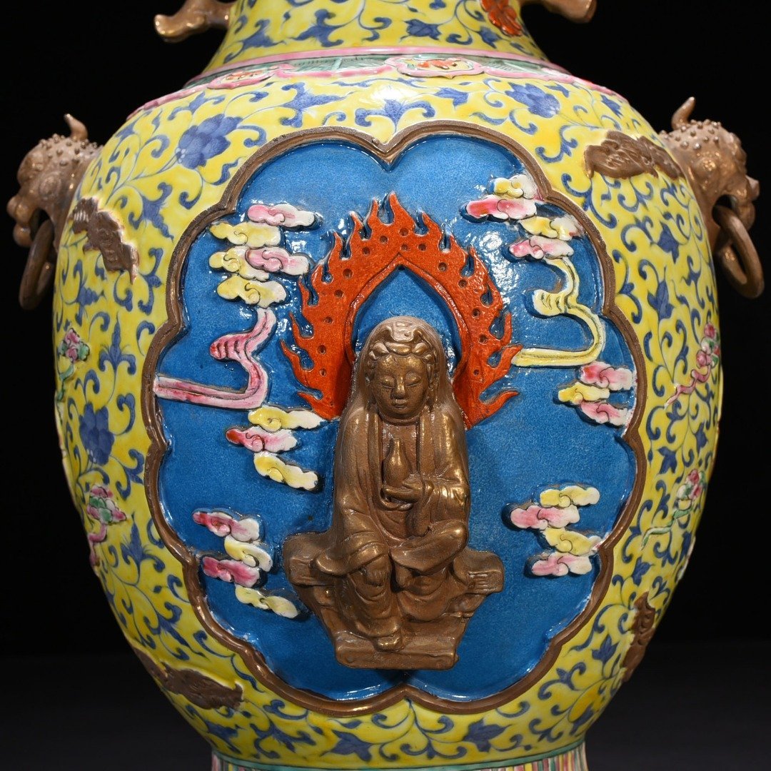 Qing Dynasty Qianlong yellow ground pastel carved Guanyin double-eared statue