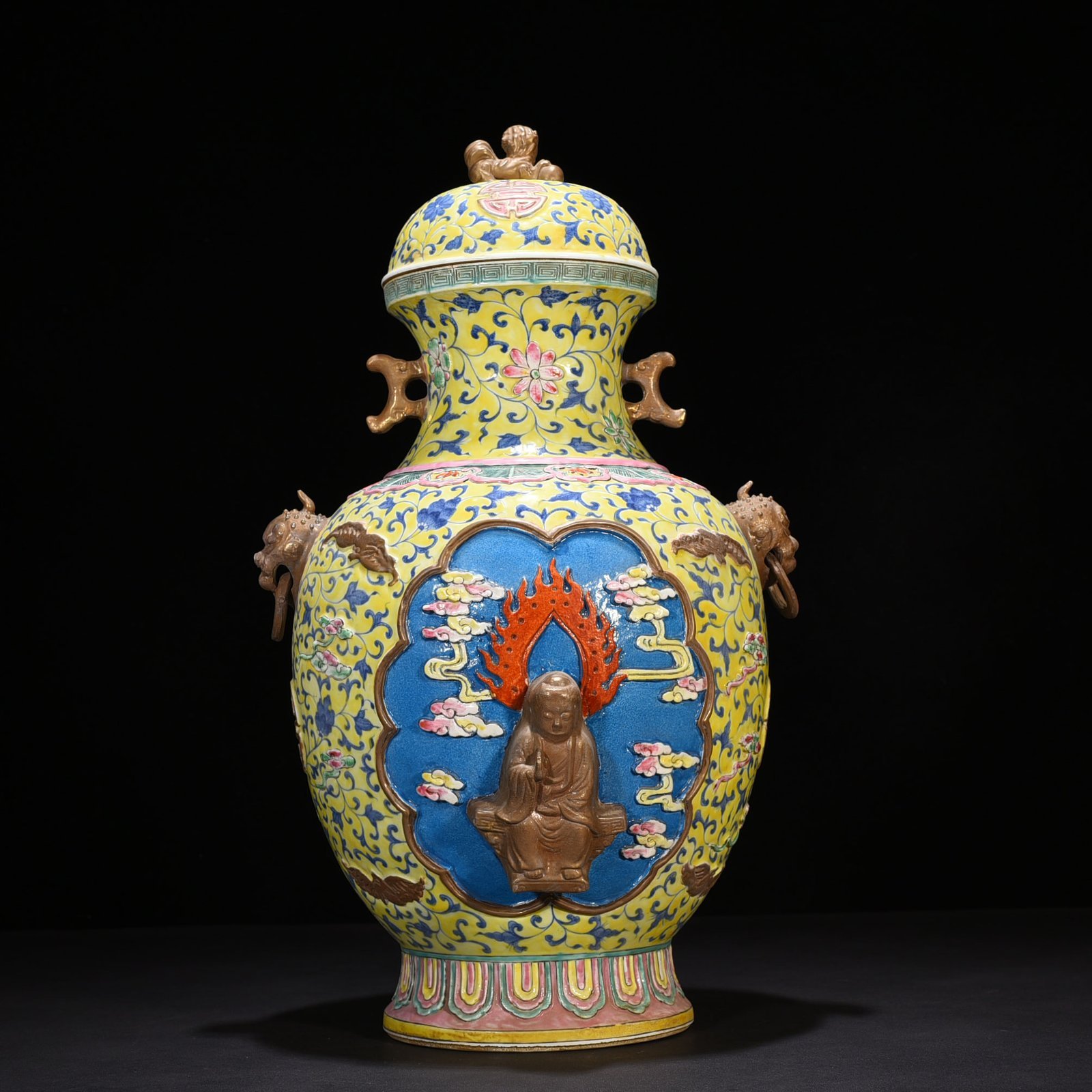 Qing Dynasty Qianlong yellow ground pastel carved Guanyin double-eared statue