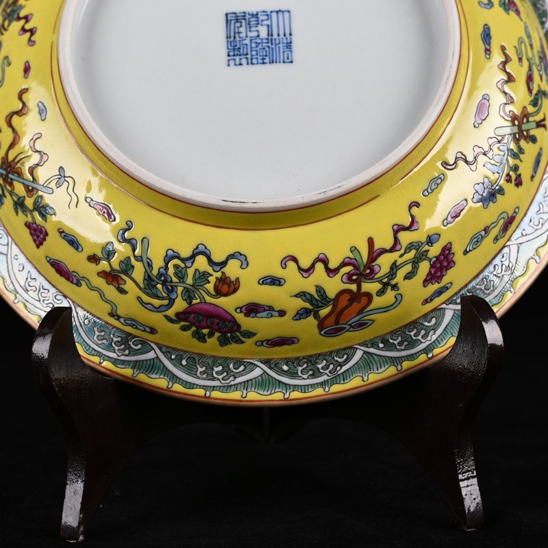 Qing Dynasty Qianlong yellow ground pastel dragon and phoenix pattern folding edge plate