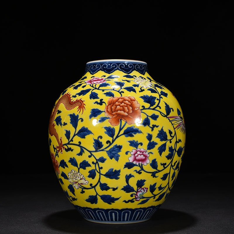 Qing Dynasty Qianlong yellow ground pastel dragon and phoenix pattern jar