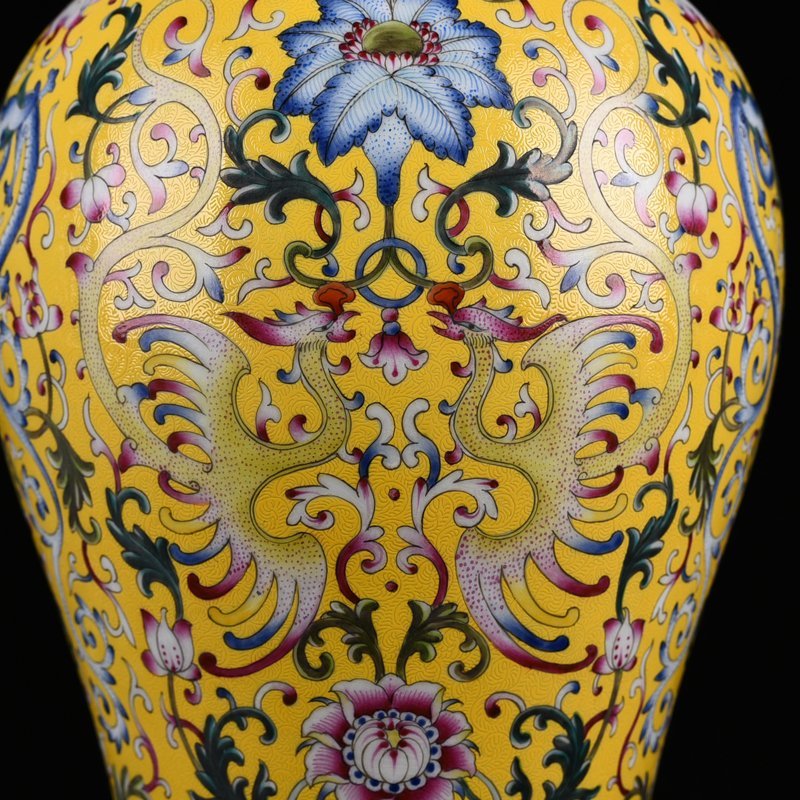 Qing Dynasty Qianlong yellow ground rolling pattern with dragon phoenix and flower pattern plum vase
