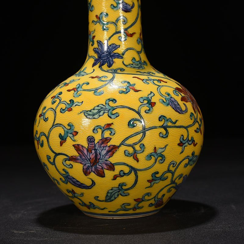 Qing Dynasty Qianlong yellow ground celestial vase with floral pattern