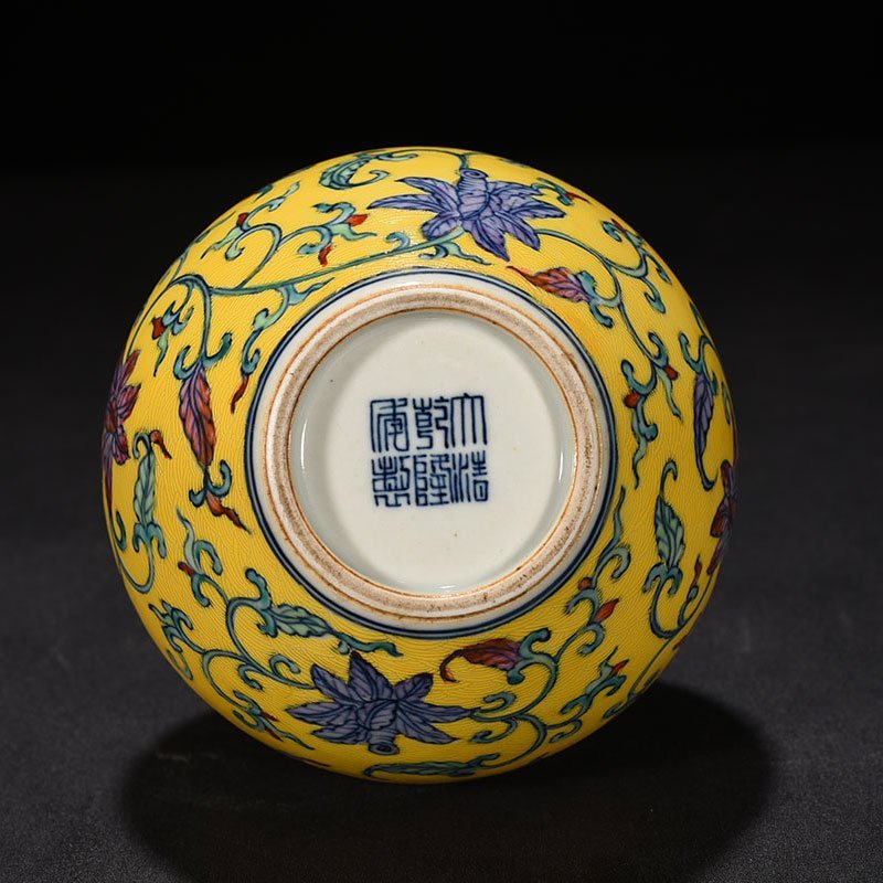 Qing Dynasty Qianlong yellow ground celestial vase with floral pattern