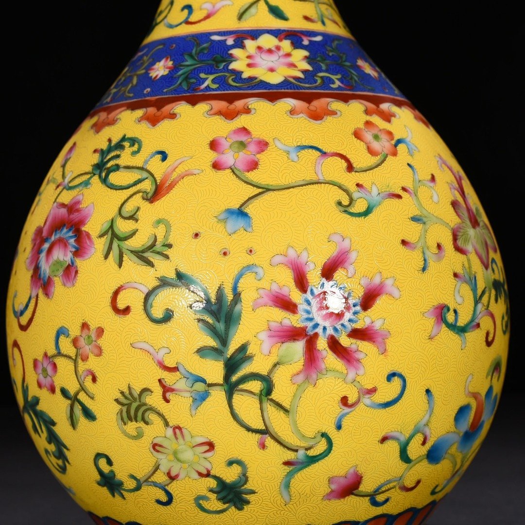 Qing Dynasty Qianlong yellow ground jade pot with floral pattern and spring vase