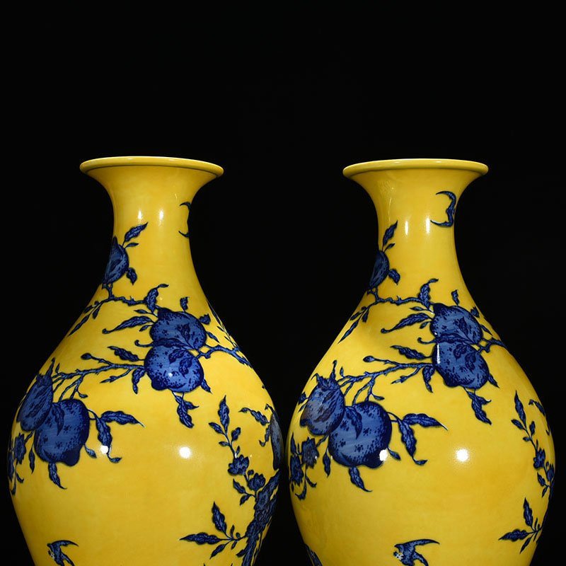 Qing Dynasty Qianlong yellow ground blue and white olive vase