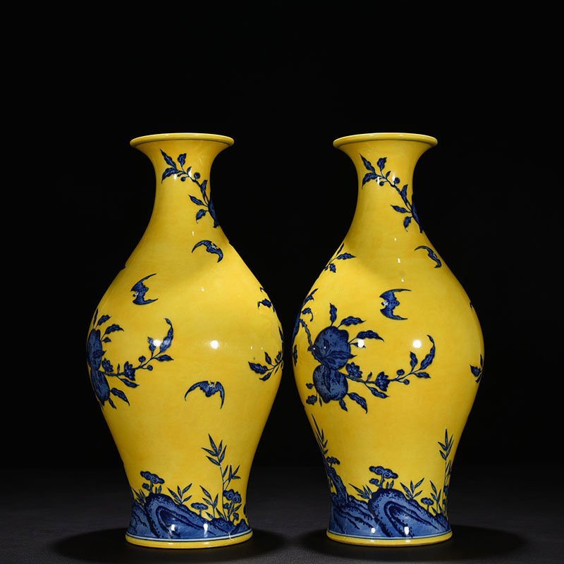 Qing Dynasty Qianlong yellow ground blue and white olive vase