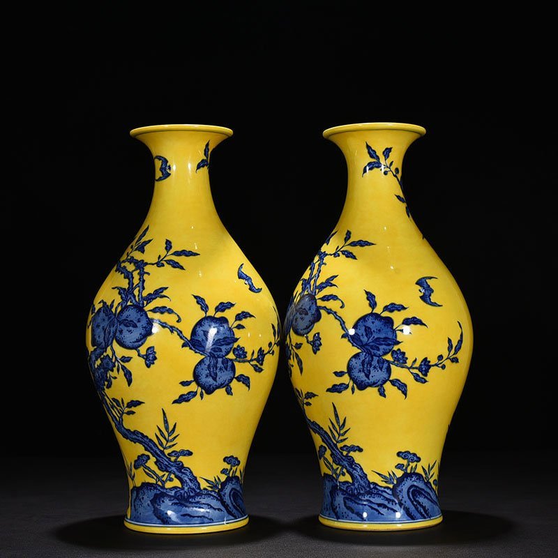 Qing Dynasty Qianlong yellow ground blue and white olive vase