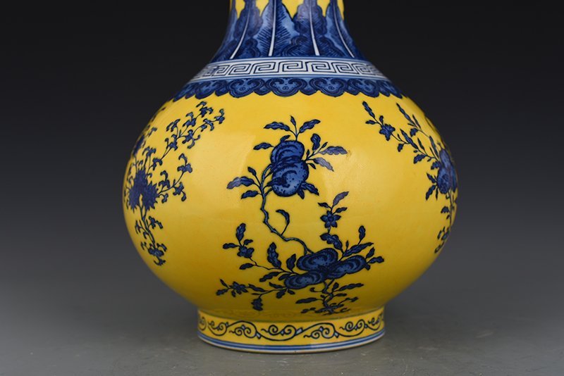 Qing Dynasty Qianlong yellow ground blue and white vase