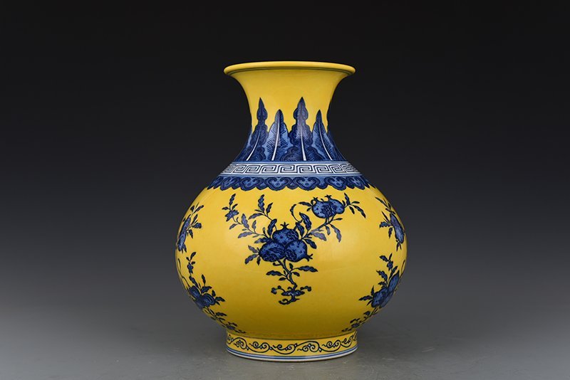 Qing Dynasty Qianlong yellow ground blue and white vase