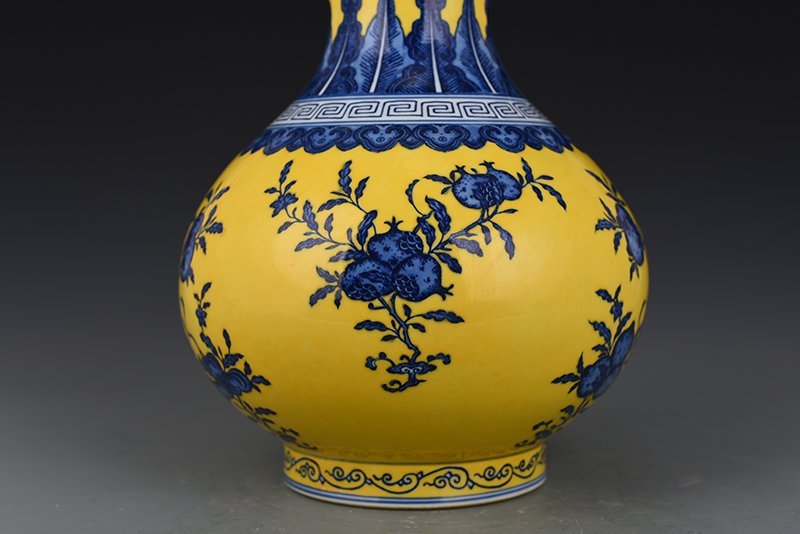 Qing Dynasty Qianlong yellow ground blue and white vase