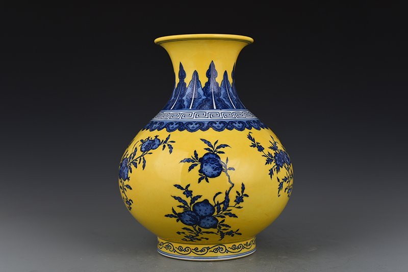 Qing Dynasty Qianlong yellow ground blue and white vase