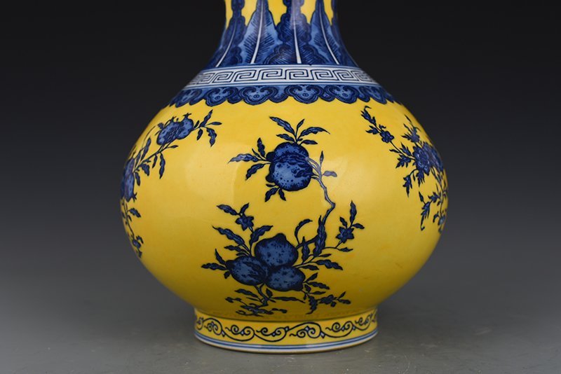 Qing Dynasty Qianlong yellow ground blue and white vase
