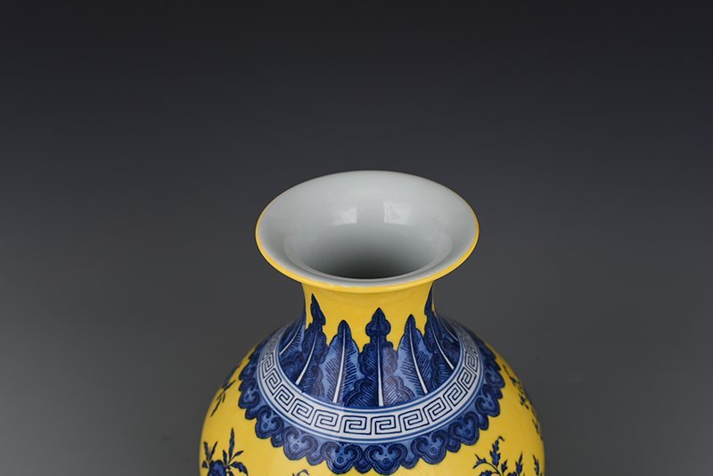 Qing Dynasty Qianlong yellow ground blue and white vase