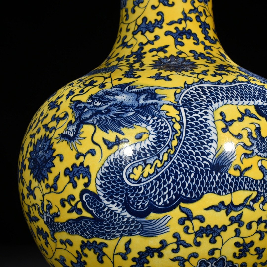 Qing Dynasty Qianlong yellow ground blue and white celestial sphere vase