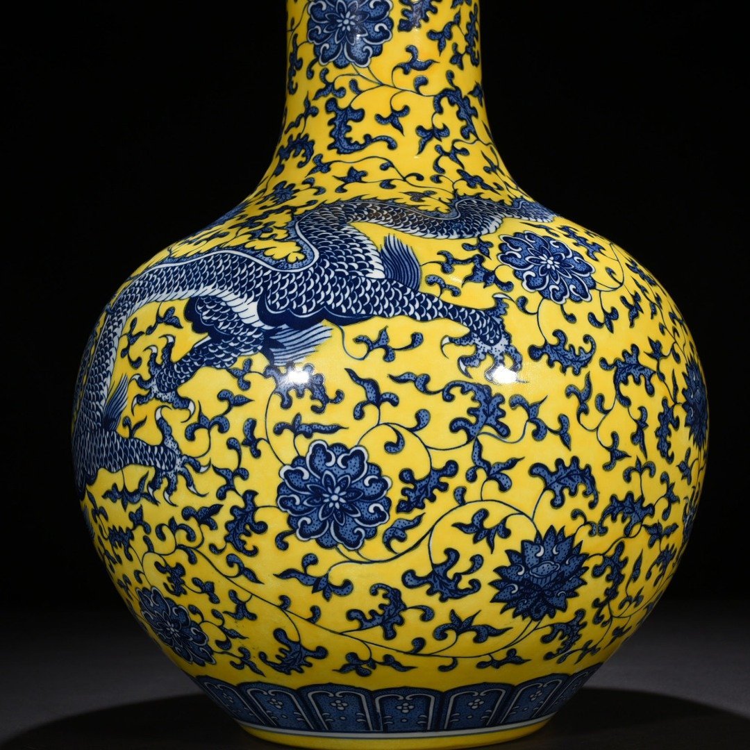 Qing Dynasty Qianlong yellow ground blue and white celestial sphere vase