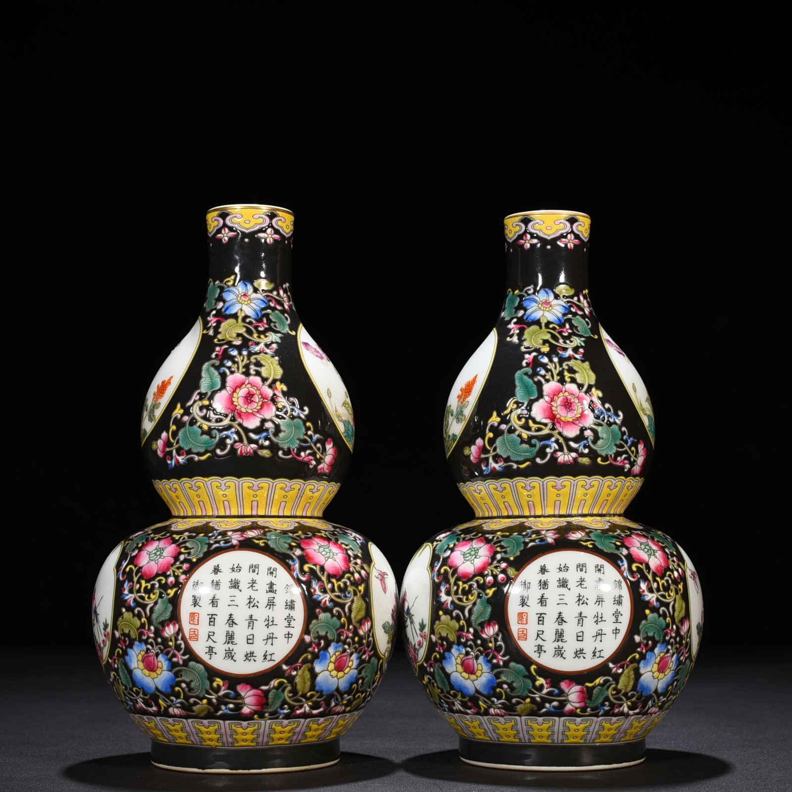 Qing Dynasty Qianlong black ground enamel gourd vase