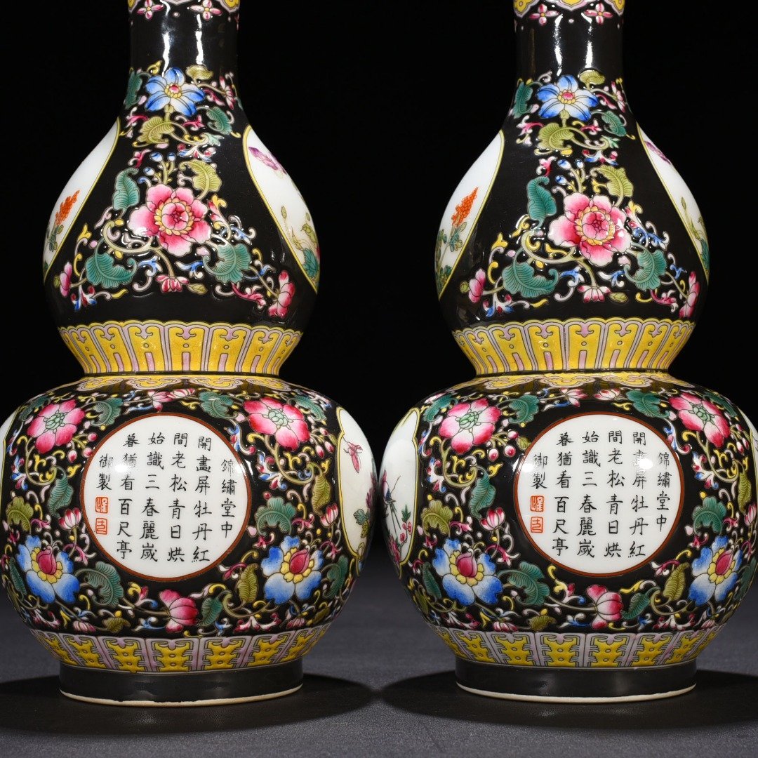 Qing Dynasty Qianlong black ground enamel gourd vase