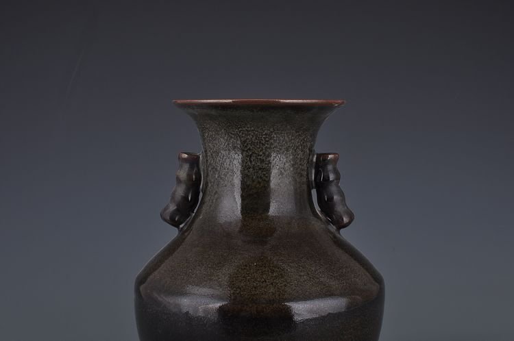 Qing Dynasty Qianlong black glaze ear-shaped vase