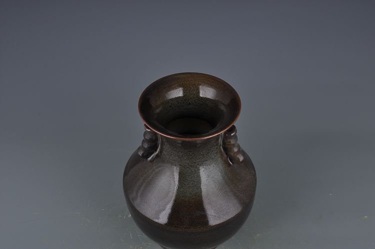Qing Dynasty Qianlong black glaze ear-shaped vase
