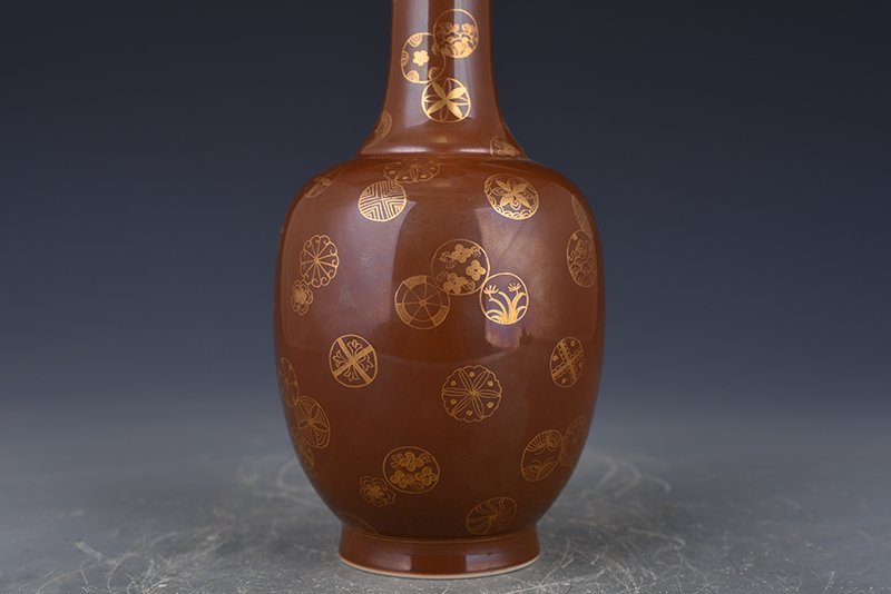 Qing Dynasty purple gold glaze with gold leather ball pattern vase