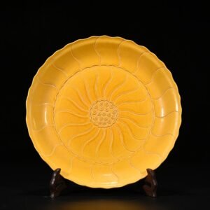 Qing Dynasty Yongzheng delicate yellow glaze plate with lotus petal pattern