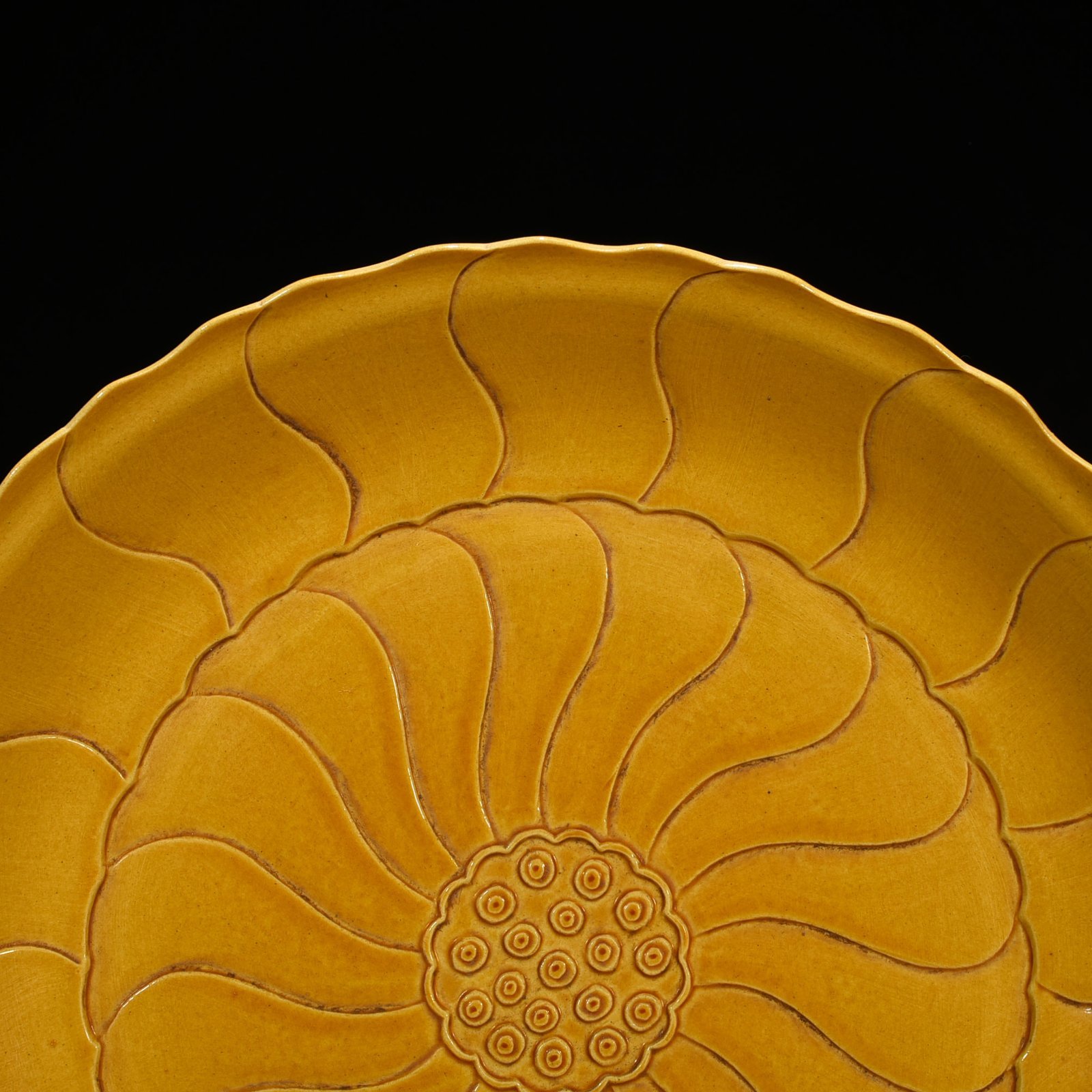 Qing Dynasty Yongzheng delicate yellow glaze lotus plate