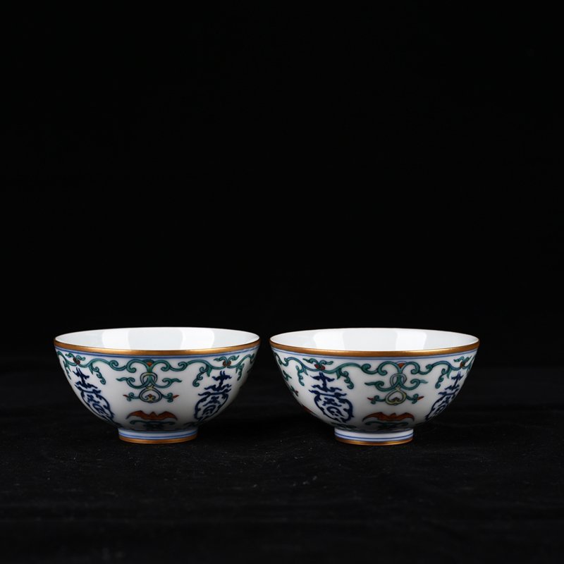 Qing Dynasty Yongzheng doucai painted gold blessing and longevity flower pattern bowl