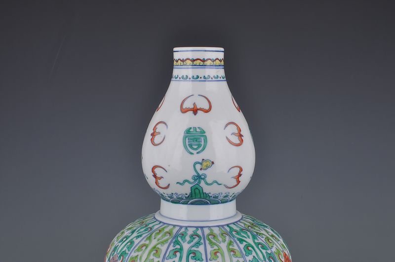 Qing Dynasty Yongzheng Doucai gourd vase with melon ribs