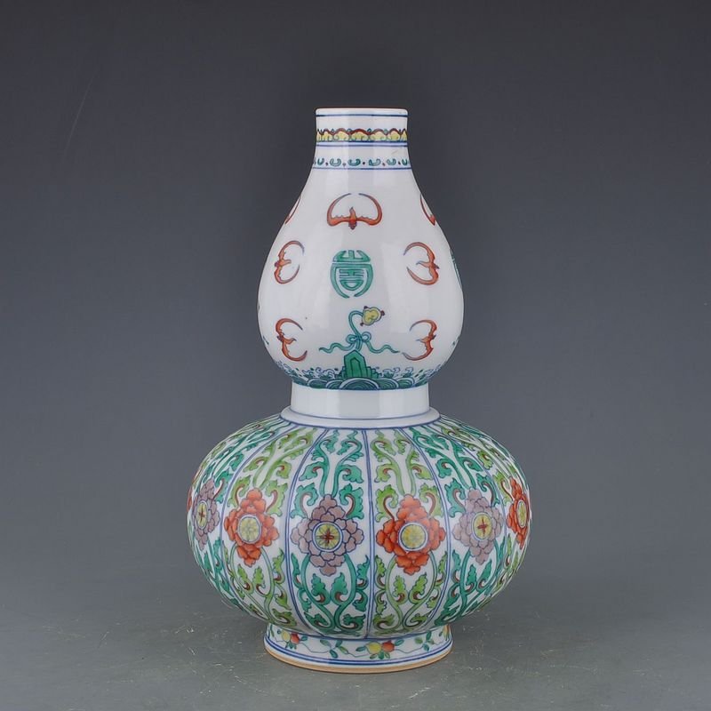 Qing Dynasty Yongzheng Doucai gourd vase with melon ribs