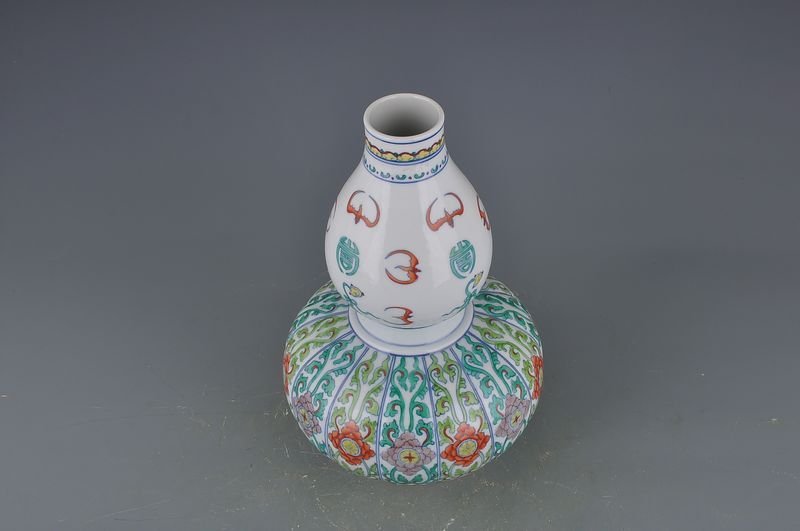 Qing Dynasty Yongzheng Doucai gourd vase with melon ribs