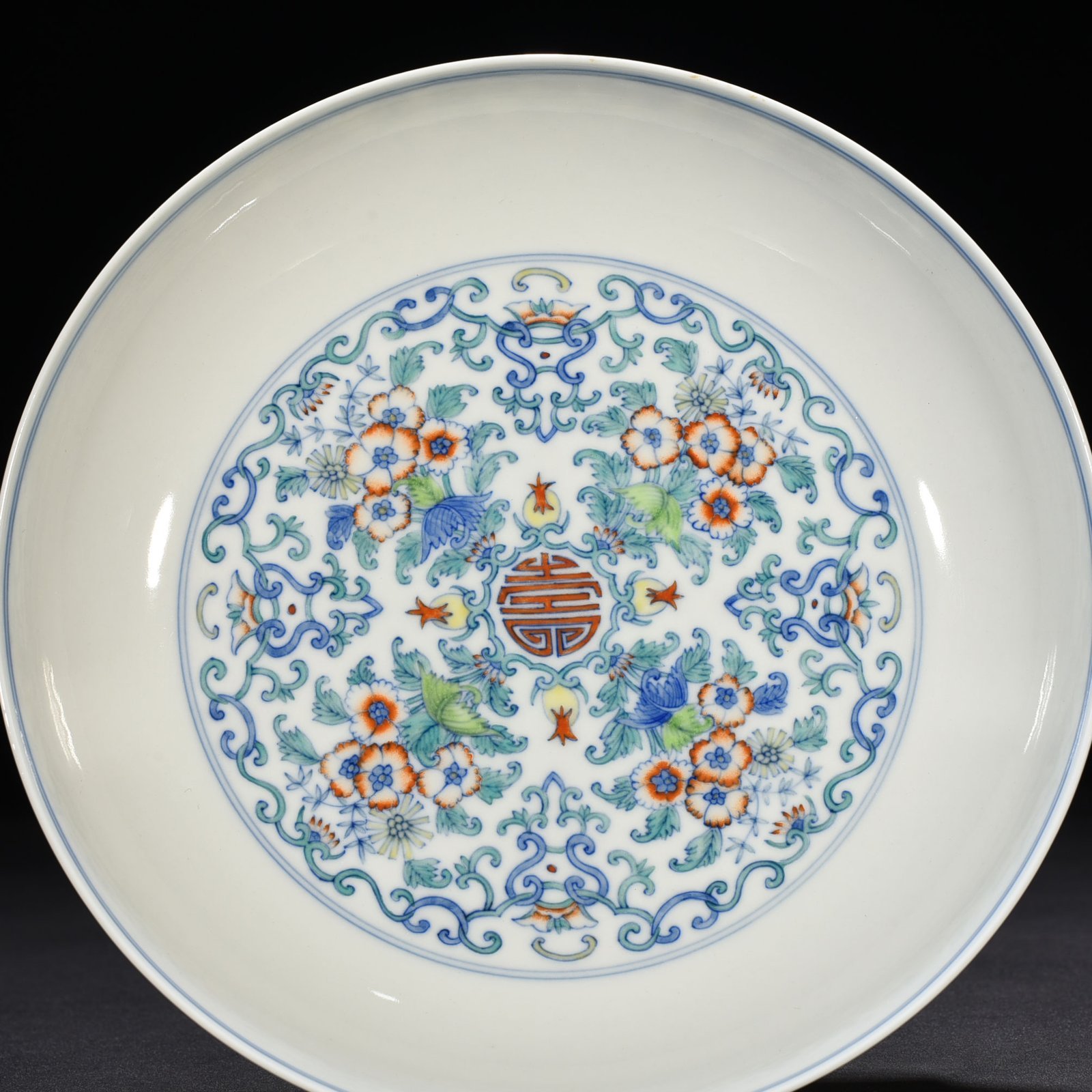Qing Dynasty Yongzheng doucai blessing and longevity flower pattern plate