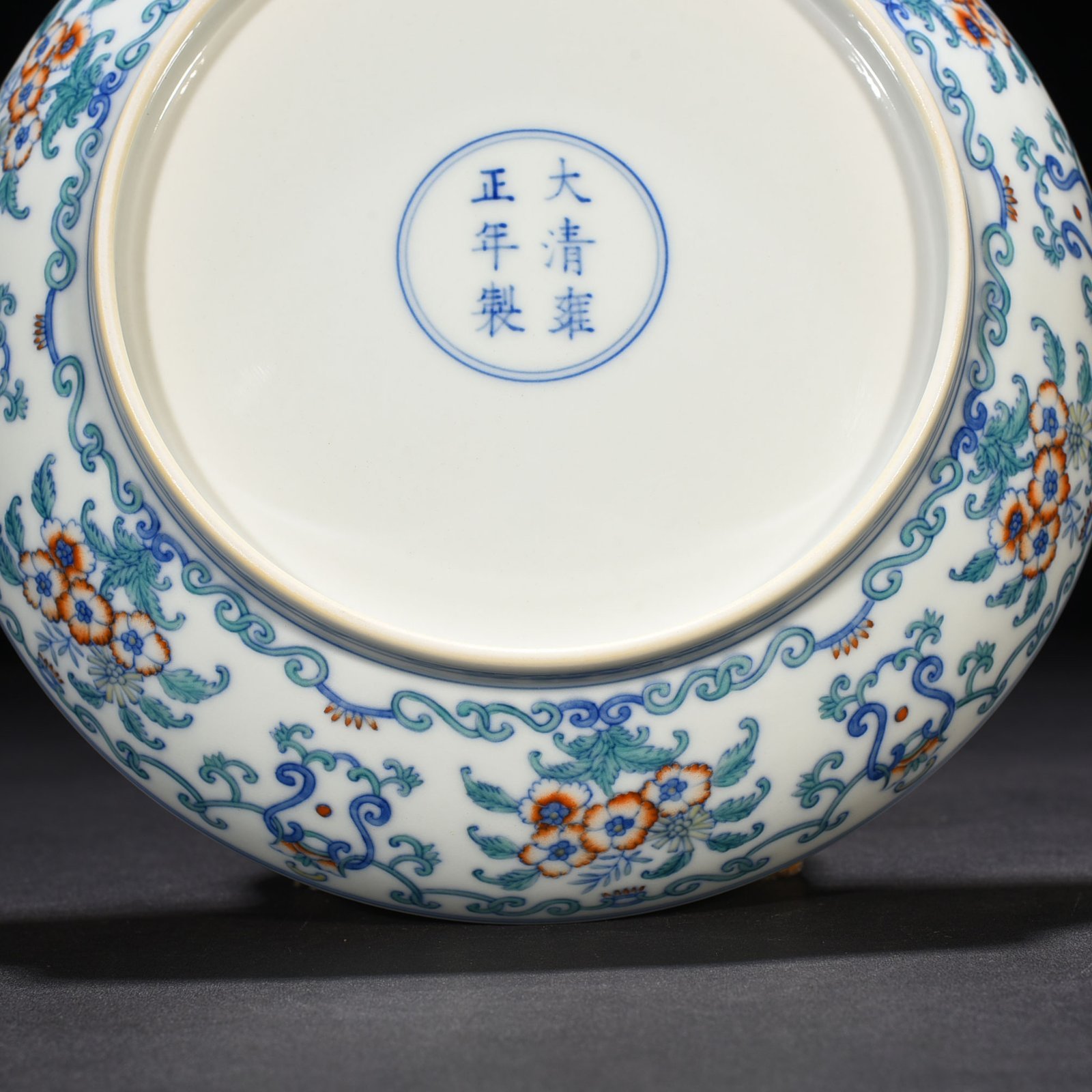 Qing Dynasty Yongzheng doucai blessing and longevity flower pattern plate