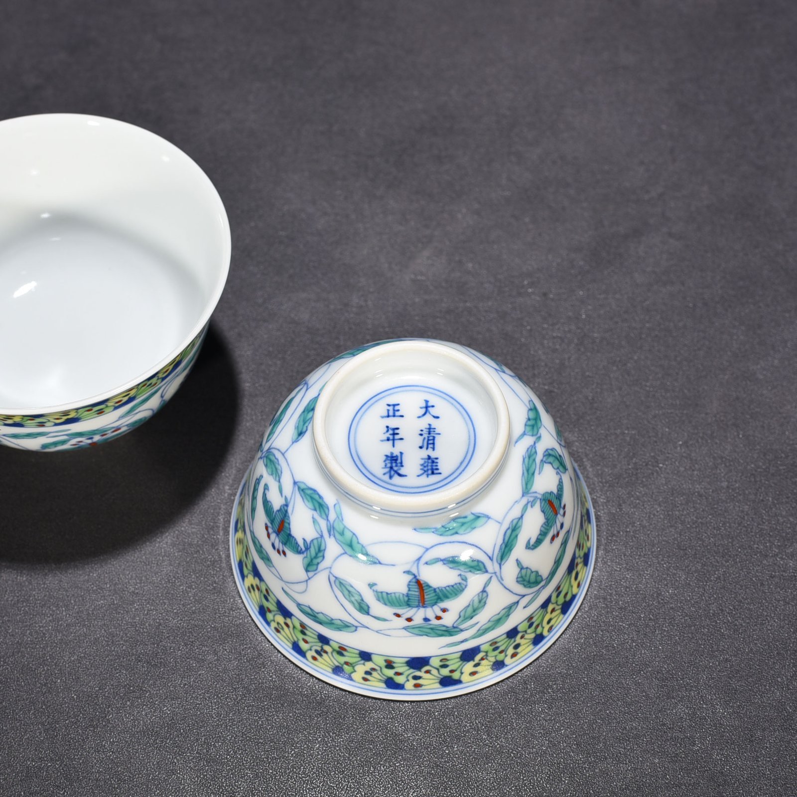 Qing Dynasty Yongzheng Doucai cup with branches and flowers pattern