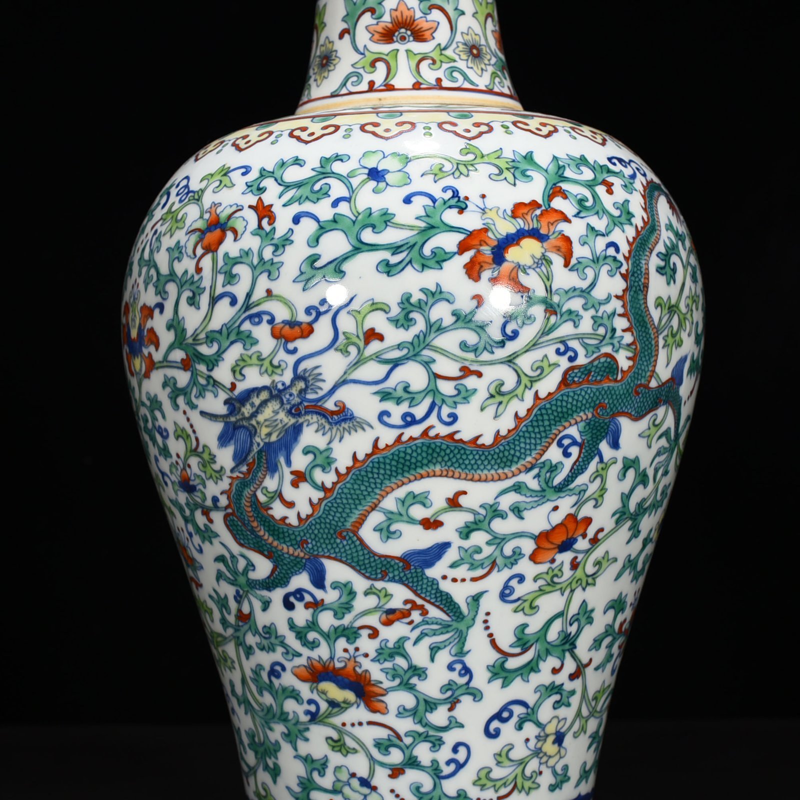 Qing Dynasty Yongzheng Doucai plum vase with dragon and phoenix patterns on branches