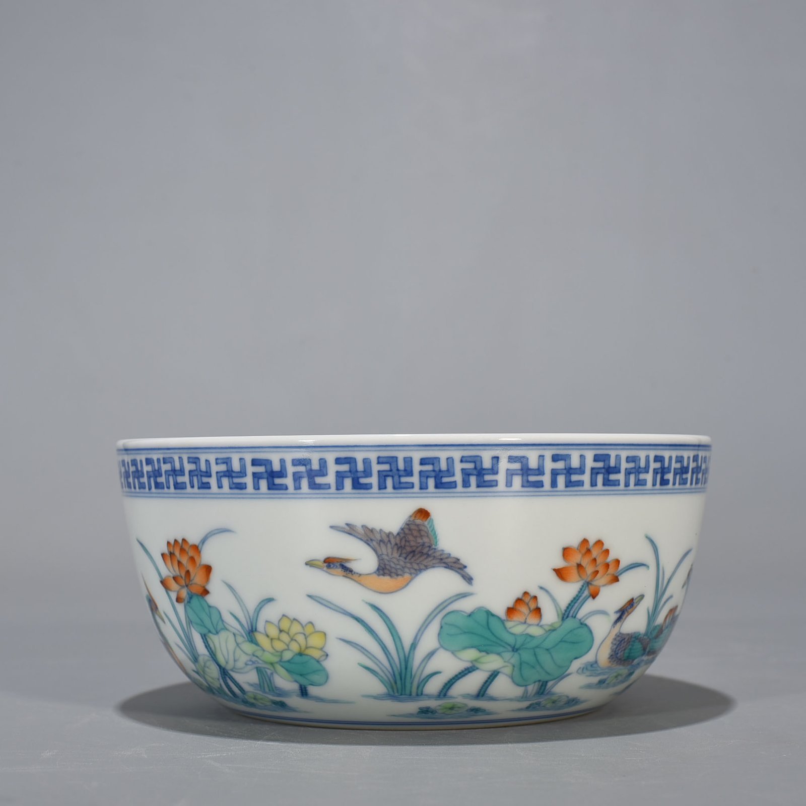 Qing Dynasty Yongzheng Doucai Lotus Pond Lying-foot Bowl