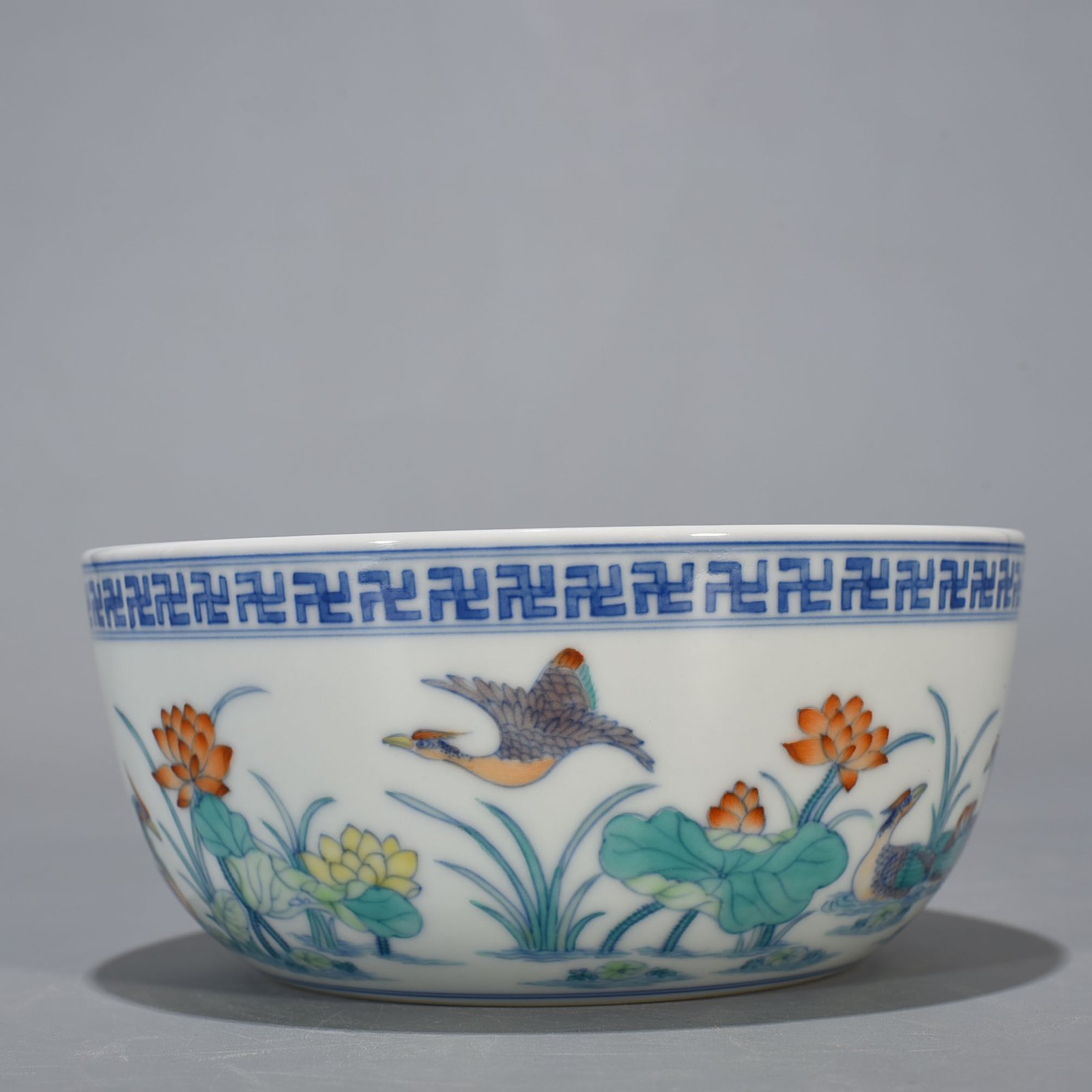 Qing Dynasty Yongzheng Doucai Lotus Pond Lying-foot Bowl