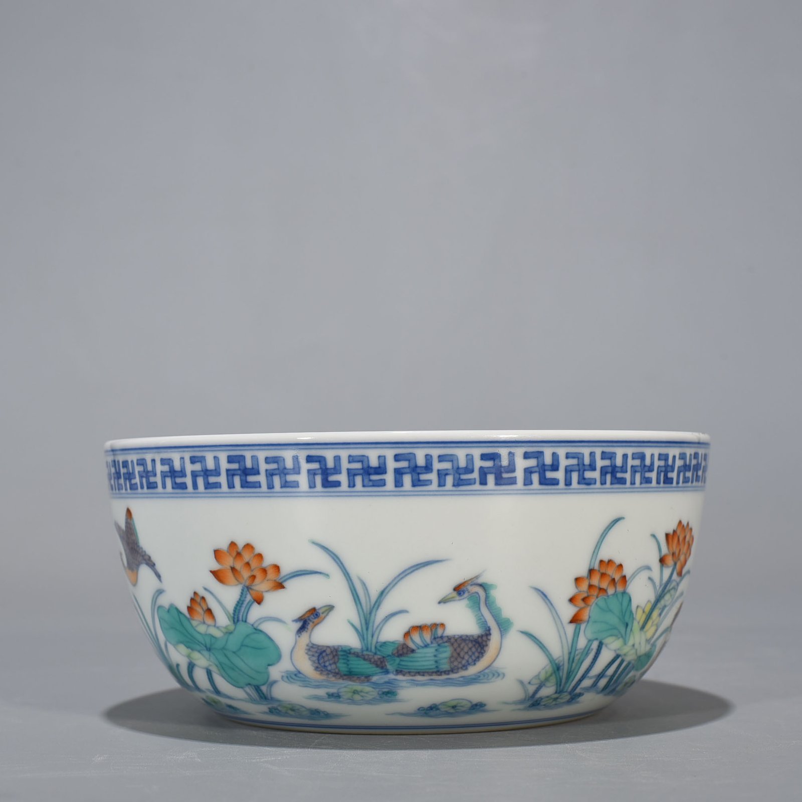Qing Dynasty Yongzheng Doucai Lotus Pond Lying-foot Bowl