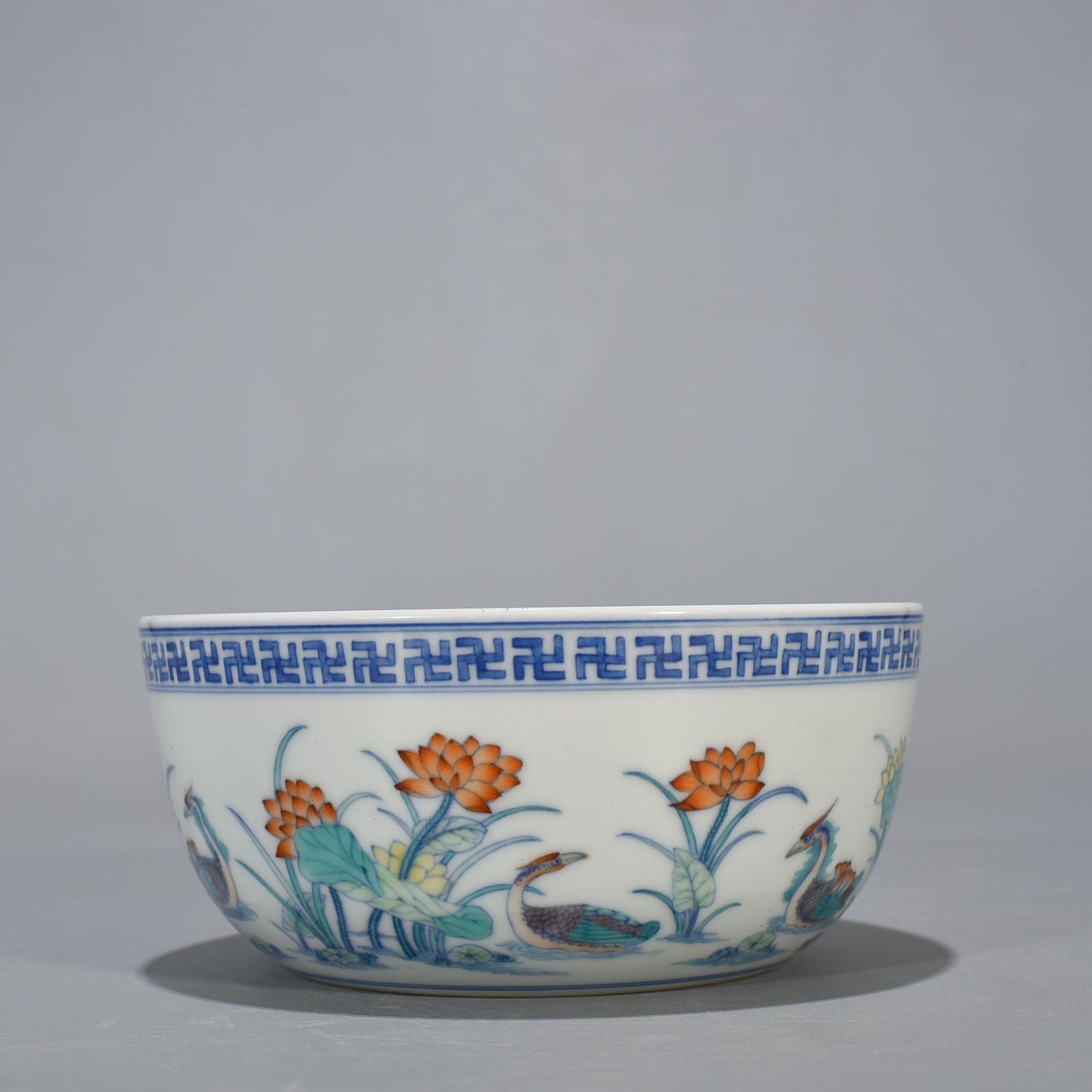 Qing Dynasty Yongzheng Doucai Lotus Pond Lying-foot Bowl