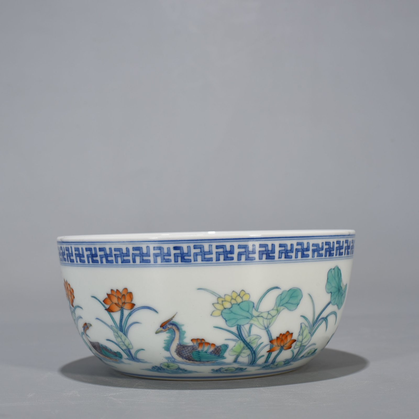 Qing Dynasty Yongzheng Doucai Lotus Pond Lying-foot Bowl