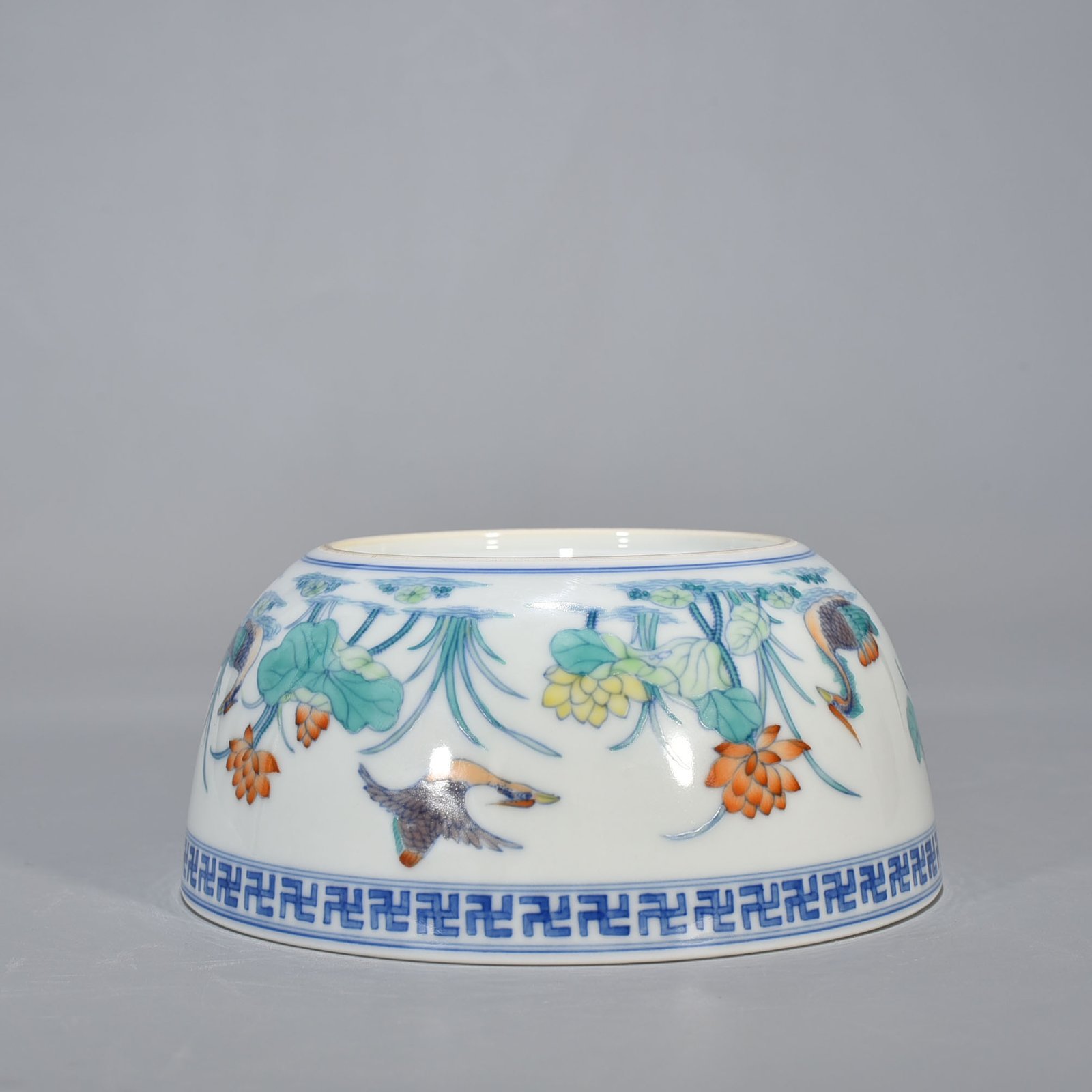 Qing Dynasty Yongzheng Doucai Lotus Pond Lying-foot Bowl