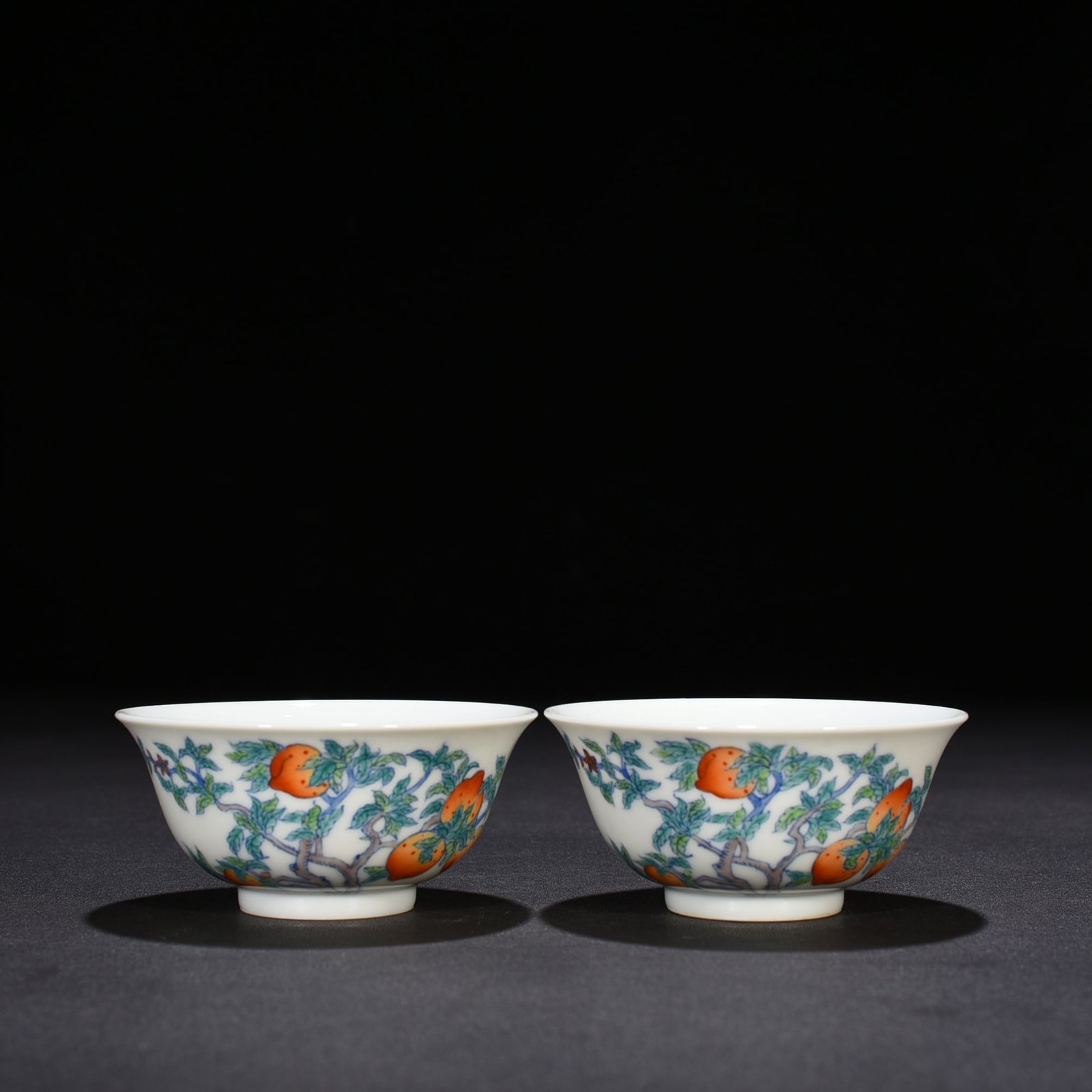 Qing Dynasty Yongzheng doucai cup with peach pattern