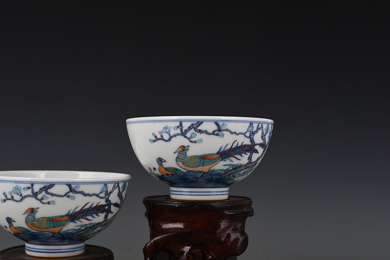 Qing Dynasty Yongzheng doucai bowl with golden pheasant flower and bird patterns