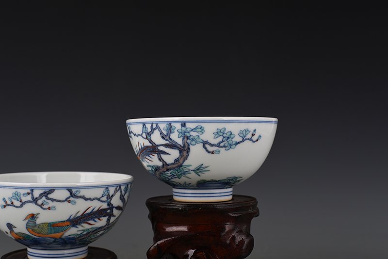 Qing Dynasty Yongzheng doucai bowl with golden pheasant flower and bird patterns