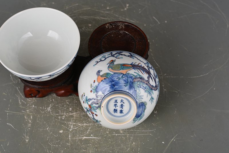 Qing Dynasty Yongzheng doucai bowl with golden pheasant flower and bird patterns