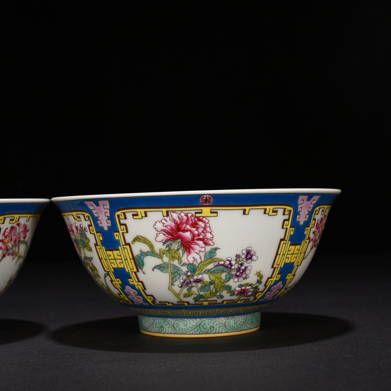 Qing Dynasty Yongzheng pastel four seasons flower pattern bowl