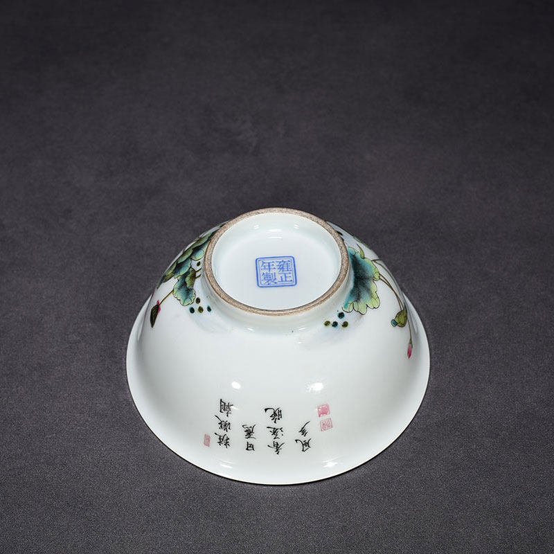 Qing Dynasty Yongzheng pastel lotus flower and bird pattern bowl