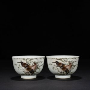 Qing Dynasty Yongzheng pastel cup with herons flowers