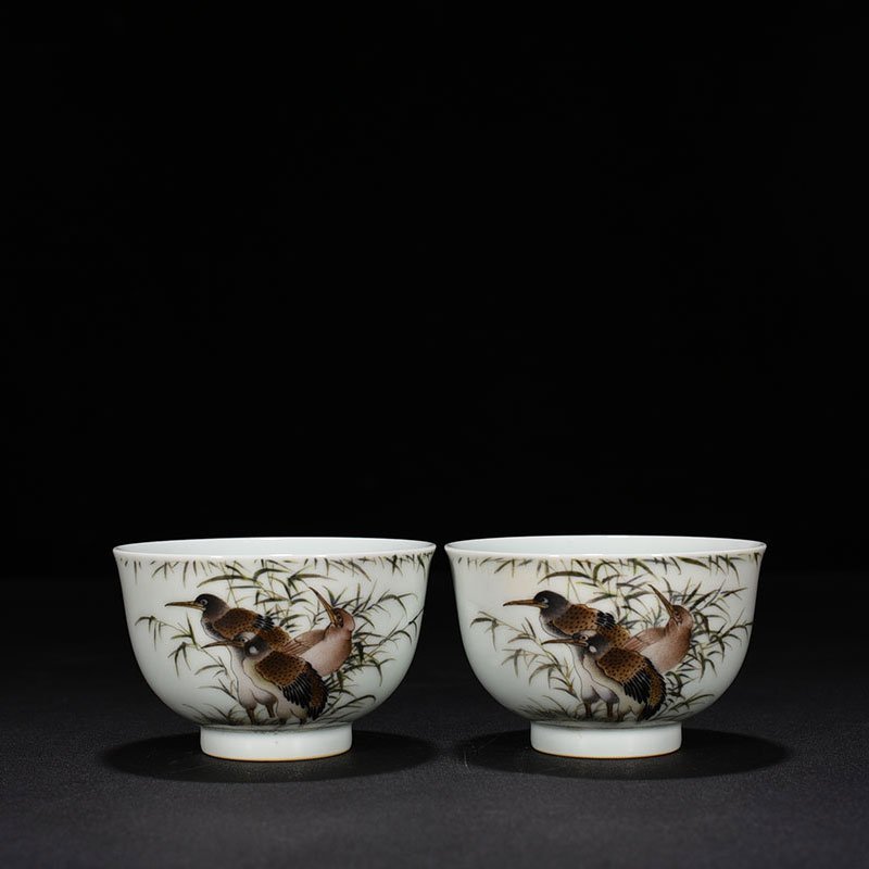 Qing Dynasty Yongzheng pastel cup with herons flowers