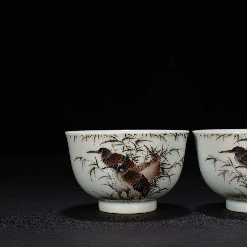 Qing Dynasty Yongzheng pastel cup with herons flowers