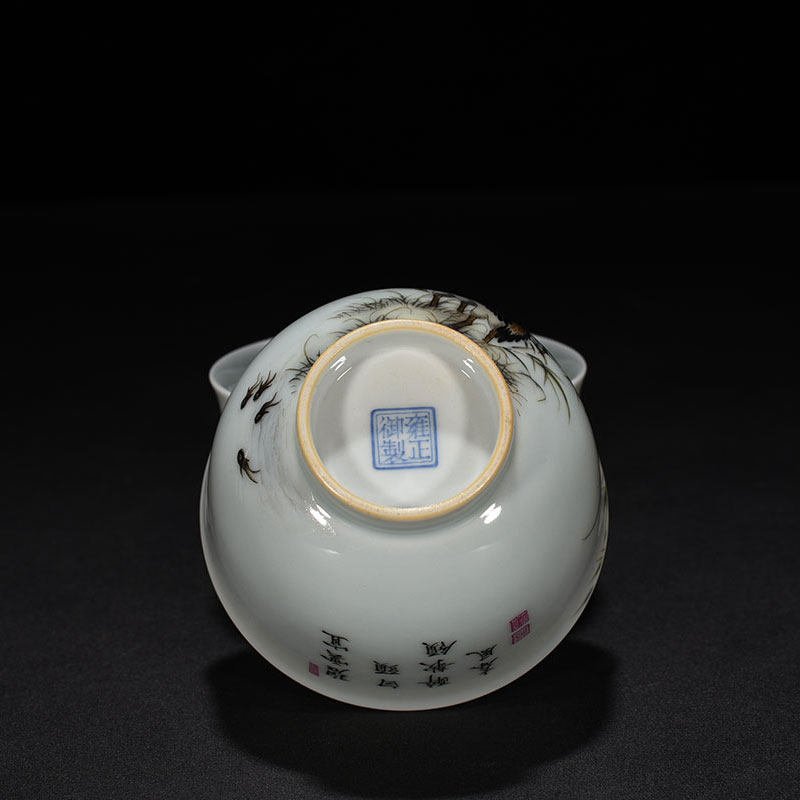 Qing Dynasty Yongzheng pastel cup with herons flowers